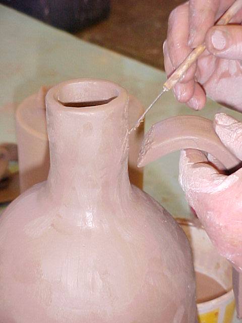 Attaching handle