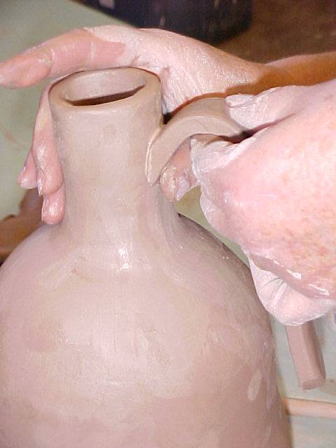 Attaching handle