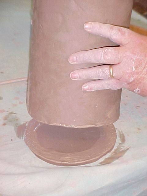 Attaching body to base