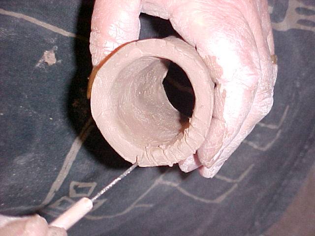 Scoring spout to attach to jug